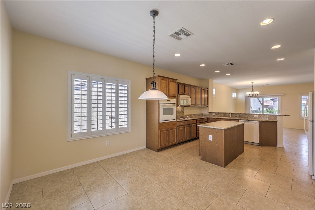 2276 Saxtons River Road Henderson, NV 89044 - Photo 14 of 49 Formal Dining Area with Tile Flooring