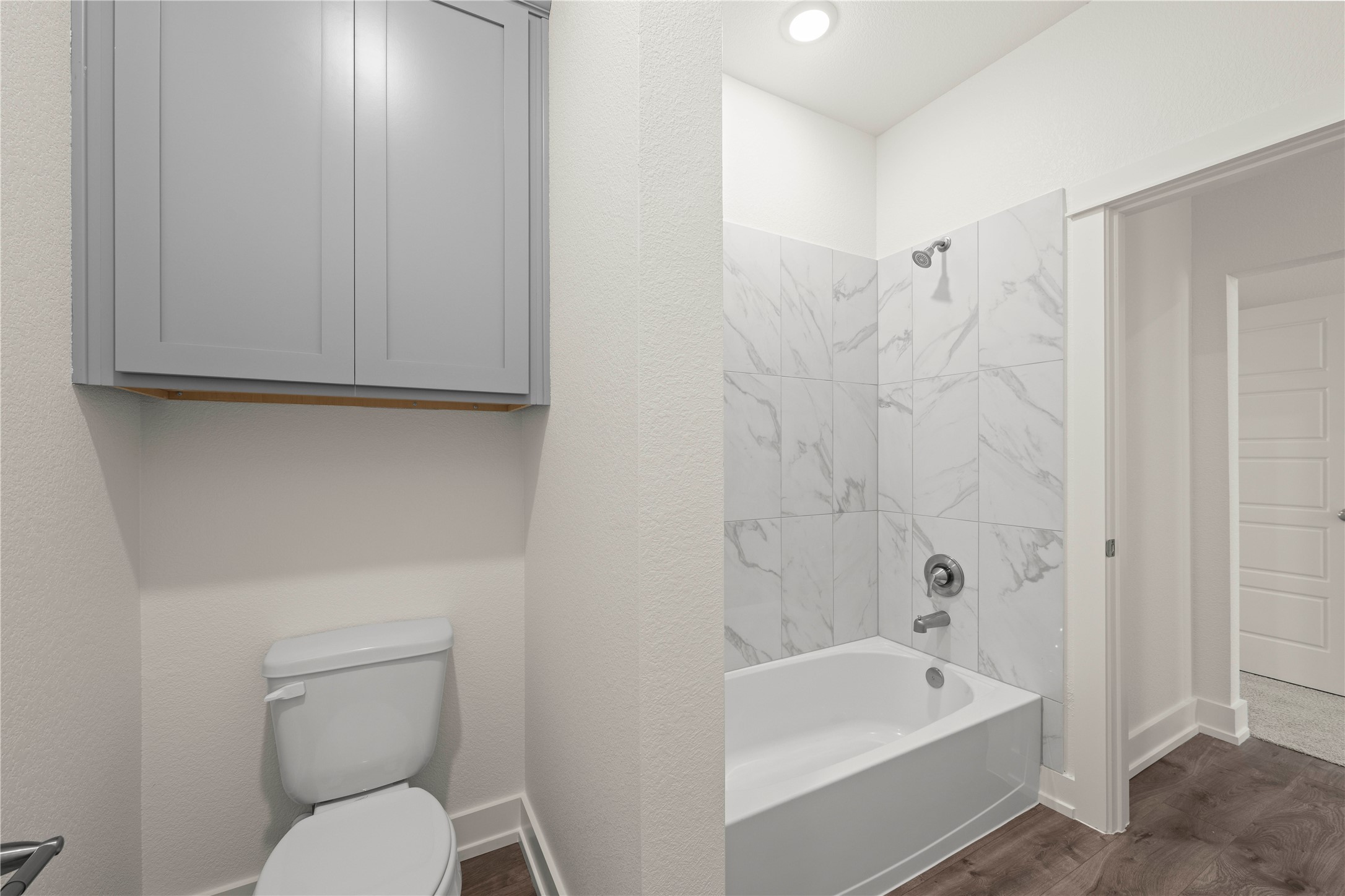 564 Gus Loop Georgetown, TX 78626 - Photo 30 of 32 a bathroom with a sink a toilet and bathtub