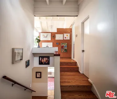 a view of a hallway with front door