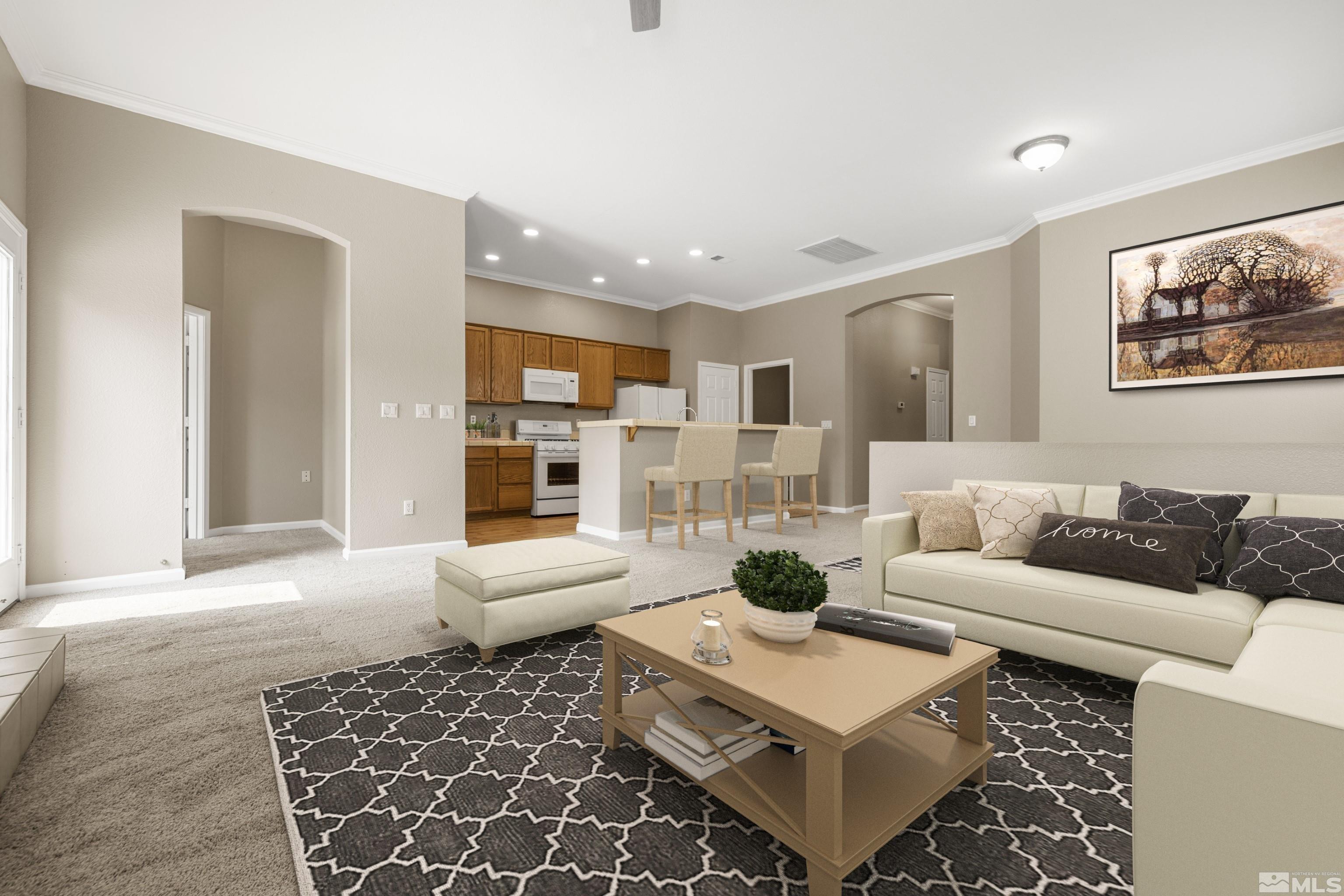 10280 Wolf Ridge Way Reno, NV 89521 - Photo 11 of 19 a living room with furniture and a rug