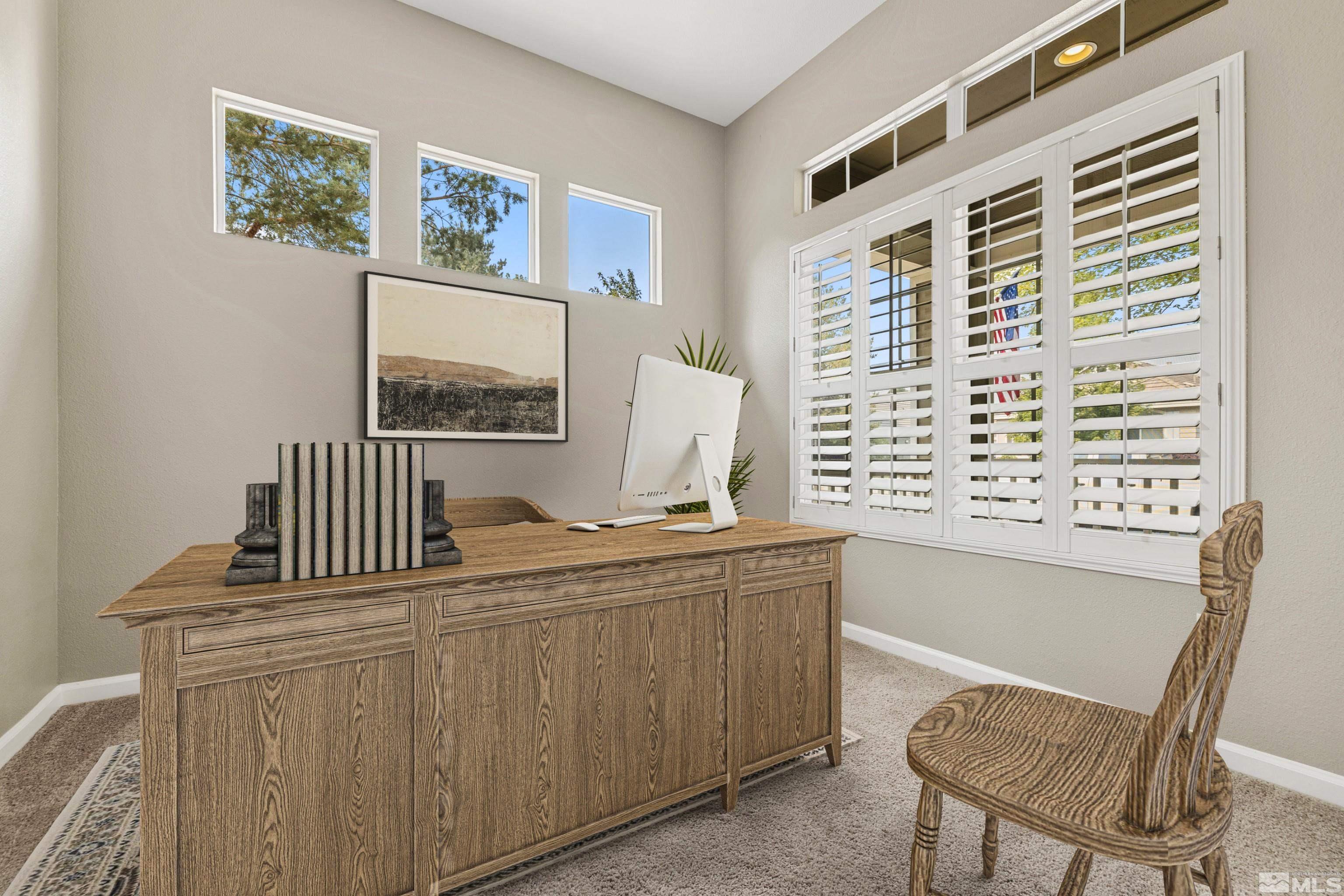 10280 Wolf Ridge Way Reno, NV 89521 - Photo 3 of 19 a view of a dining room with furniture and a window
