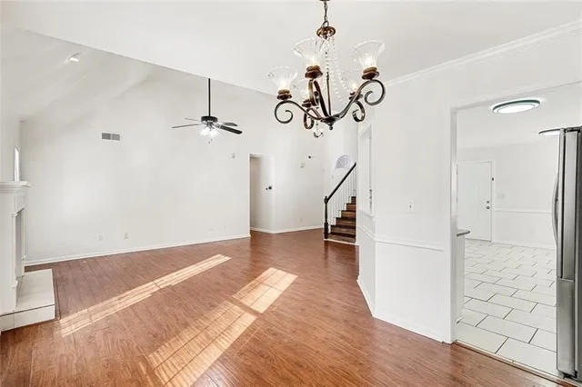 a view of a livingroom with wooden floor