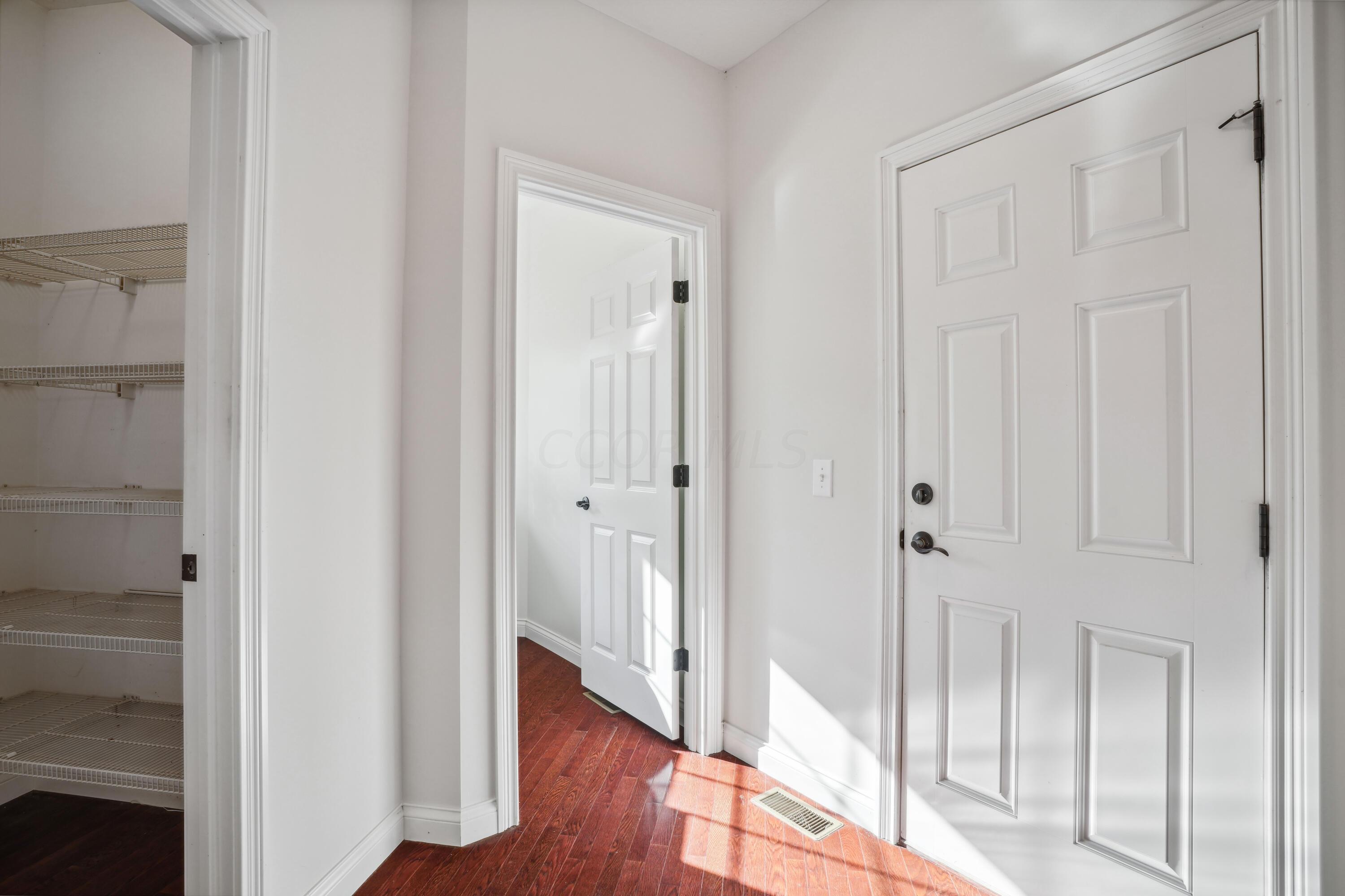10403 Liberty Road Powell, OH 43065 - Photo 30 of 76 Hall to Walk-in Pantry and 1st Floor Laundry Room!