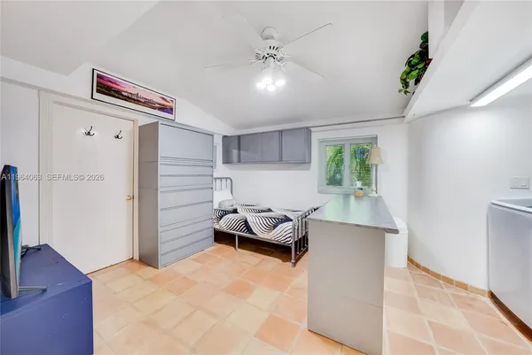 a view of a swimming pool with palm trees