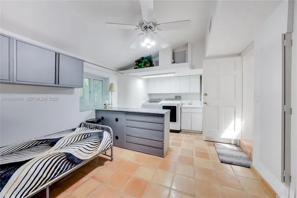 a view of water heater room with furniture