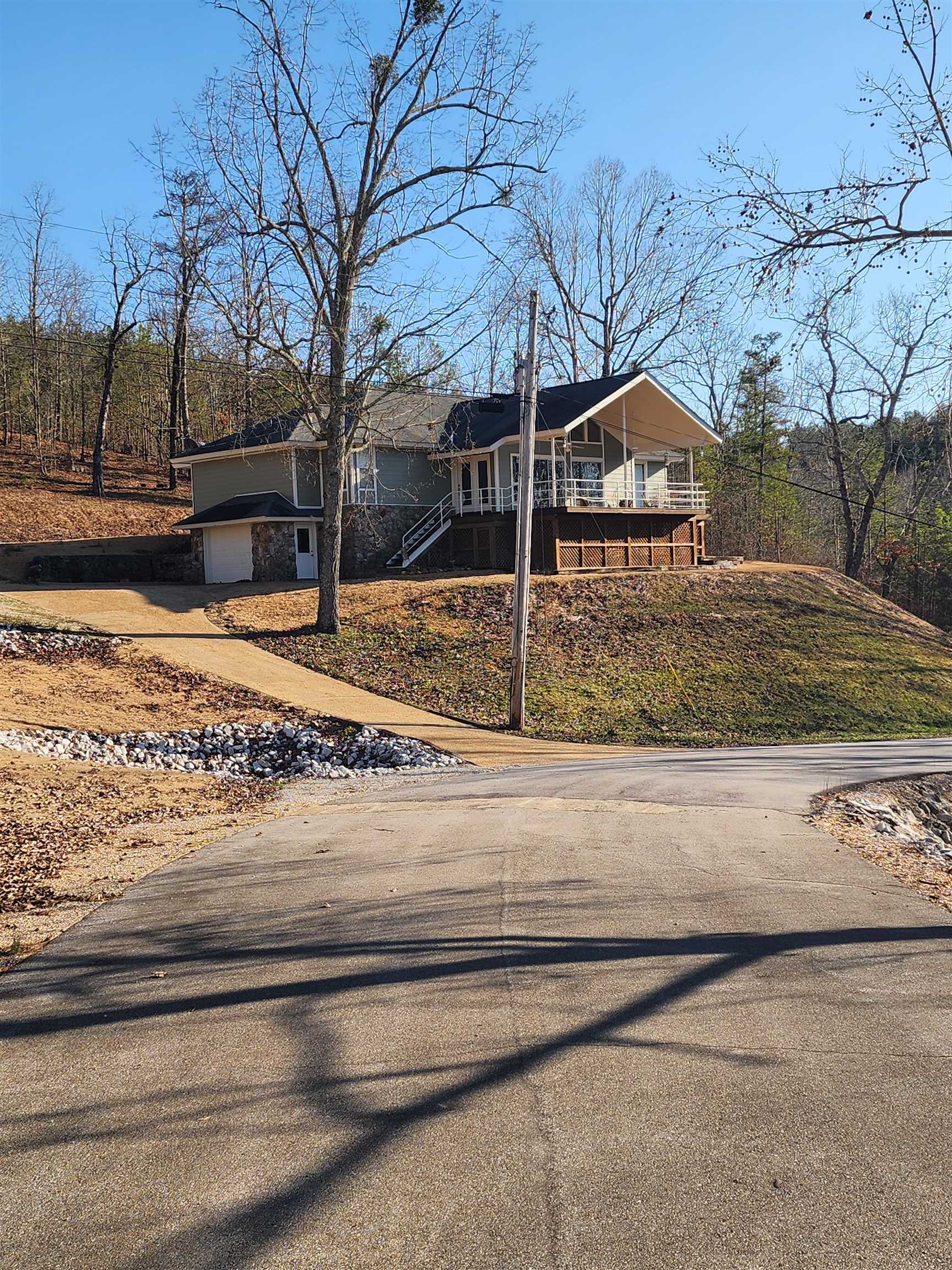 71 Chickasaw Trace Cherokee, AL 35616 - Photo 1 of 19 Elevated property featuring a stone and siding exterior