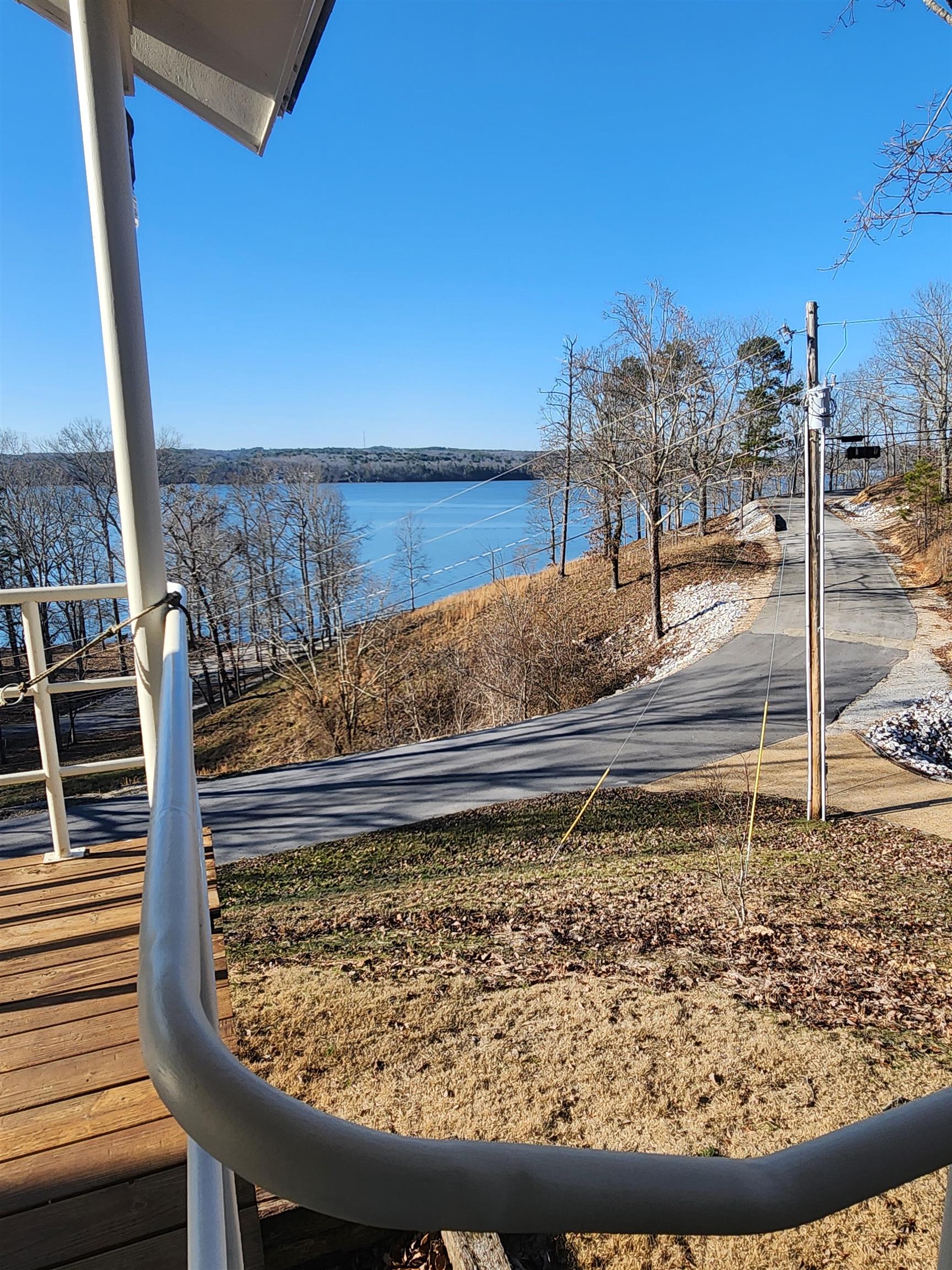 71 Chickasaw Trace Cherokee, AL 35616 - Photo 4 of 19 Waterfront setting featuring expansive water, distant tree-lined shores, and a paved road