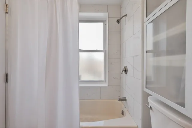 a bathroom with a bathtub