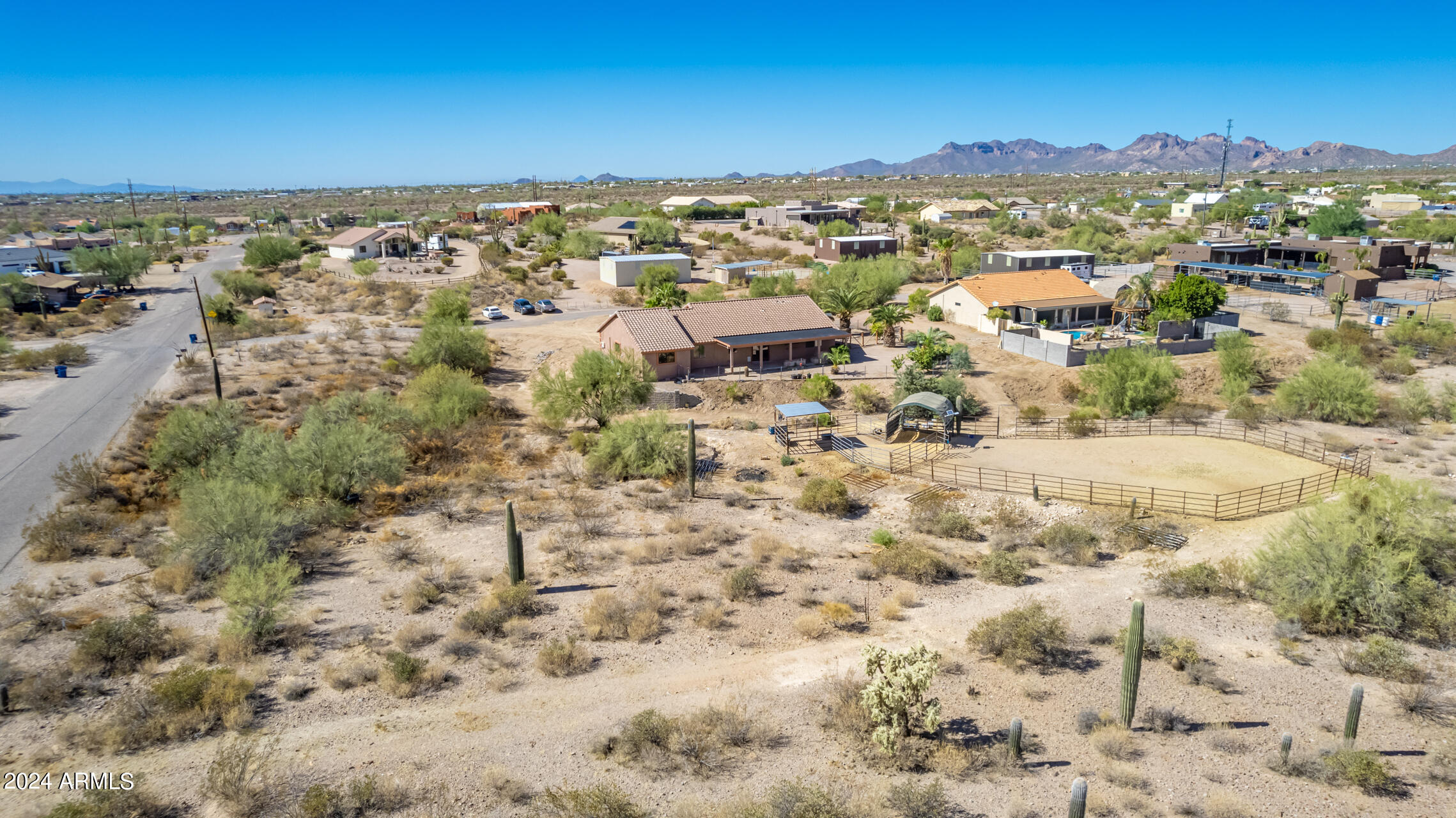 57 North Roadrunner Road Apache Junction, AZ 85119 - Photo 42 of 44 an aerial view of residential building and parking space