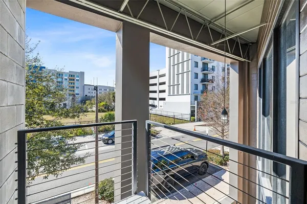 a bedroom with bed and a window