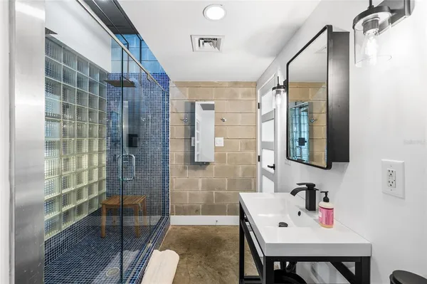 a view of a livingroom with furniture and wooden floor