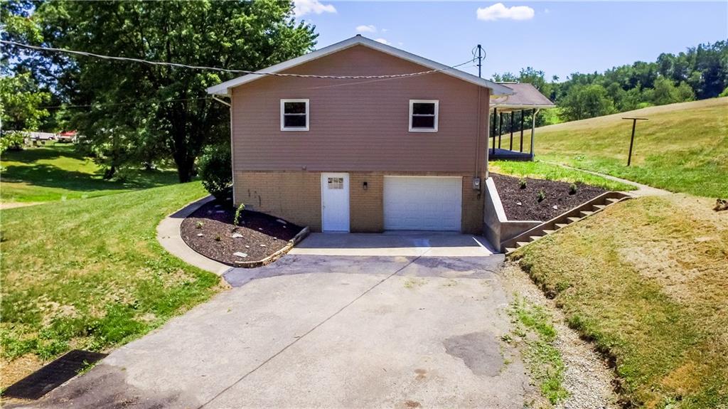 121 Brice Road Kittanning, PA 16201 - Photo 23 of 25 Paved Driveway and Well Maintained Yard