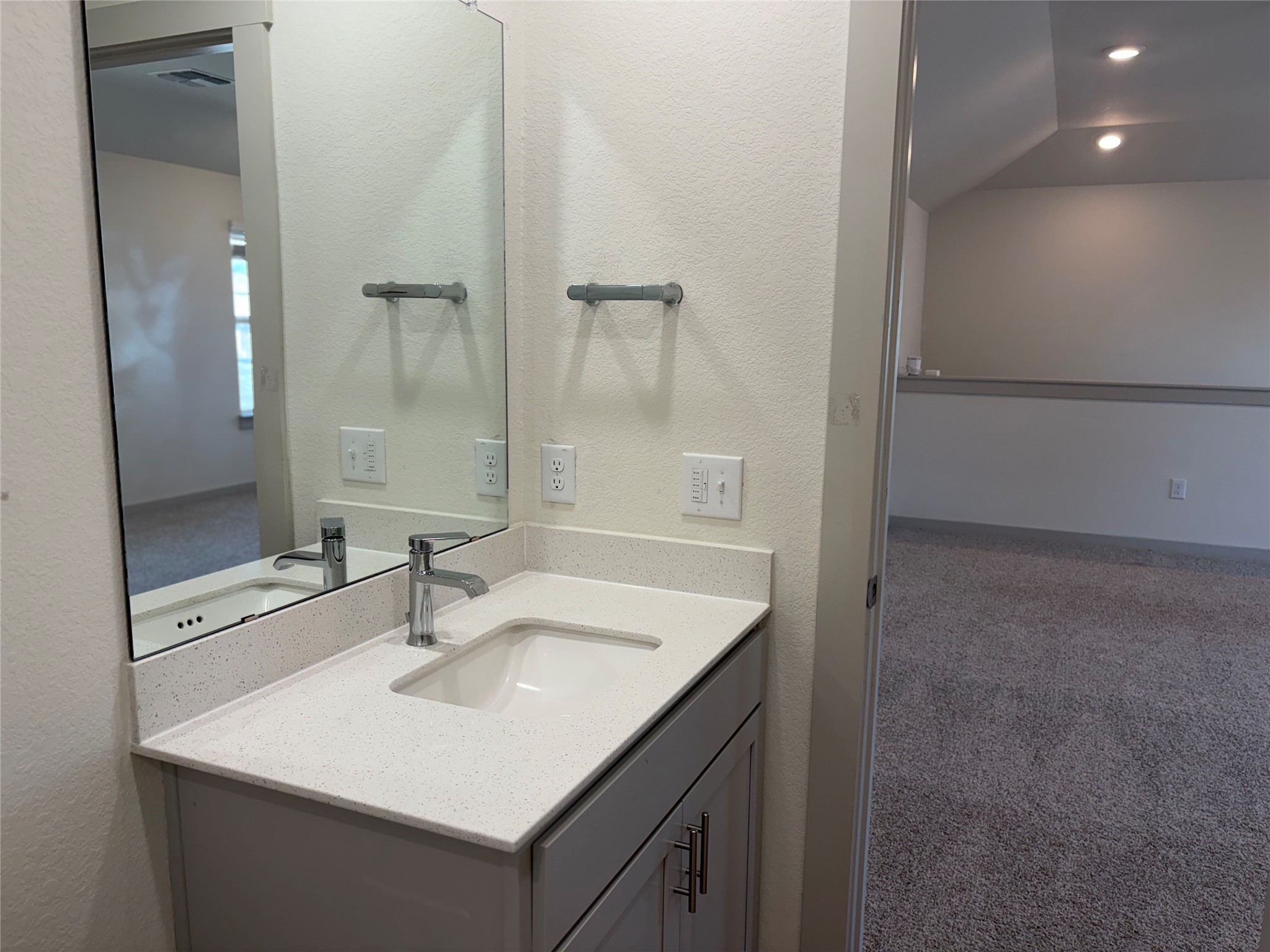 10708 Gonzales Ranger Pass Austin, TX 78754 - Photo 31 of 40 Modern bath vanity with sleek counters and a convenient sink.