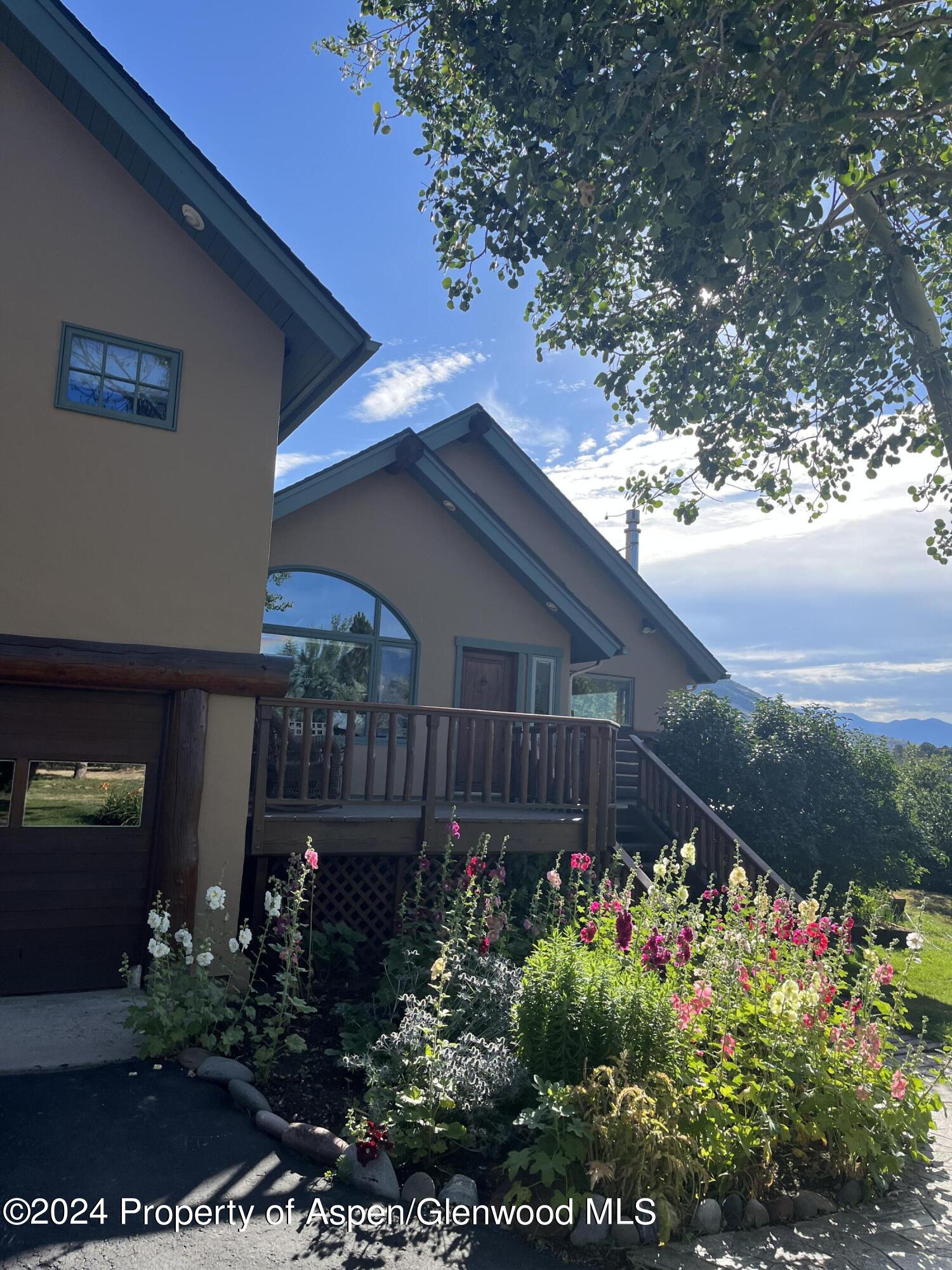 234 Light Hill Road Snowmass, CO 81654 - Photo 3 of 22 a view of a garden
