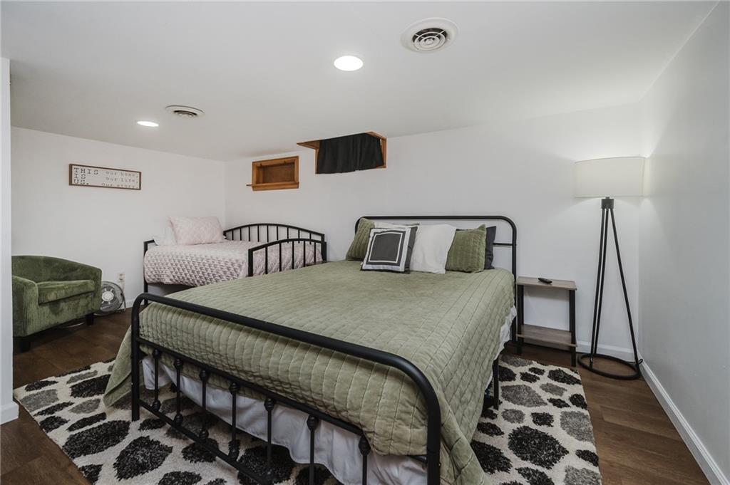 426 Grant Street Indiana, PA 15701 - Photo 20 of 33 a bedroom with a bed and wooden floor