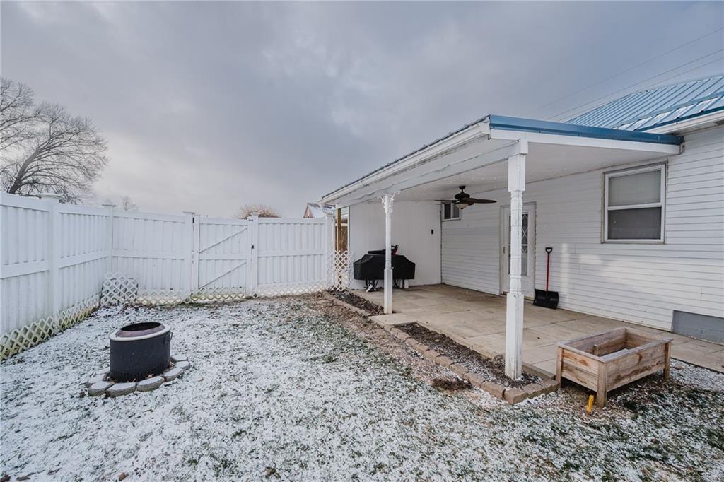 426 Grant Street Indiana, PA 15701 - Photo 29 of 33 a view of a backyard with table and chairs and wooden fence