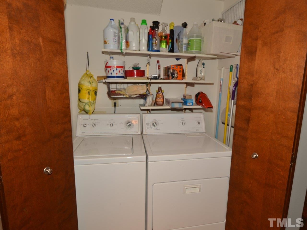 2812 Old Orchard Road Raleigh, NC 27607 - Photo 18 of 25 a utility room with dryer and washer