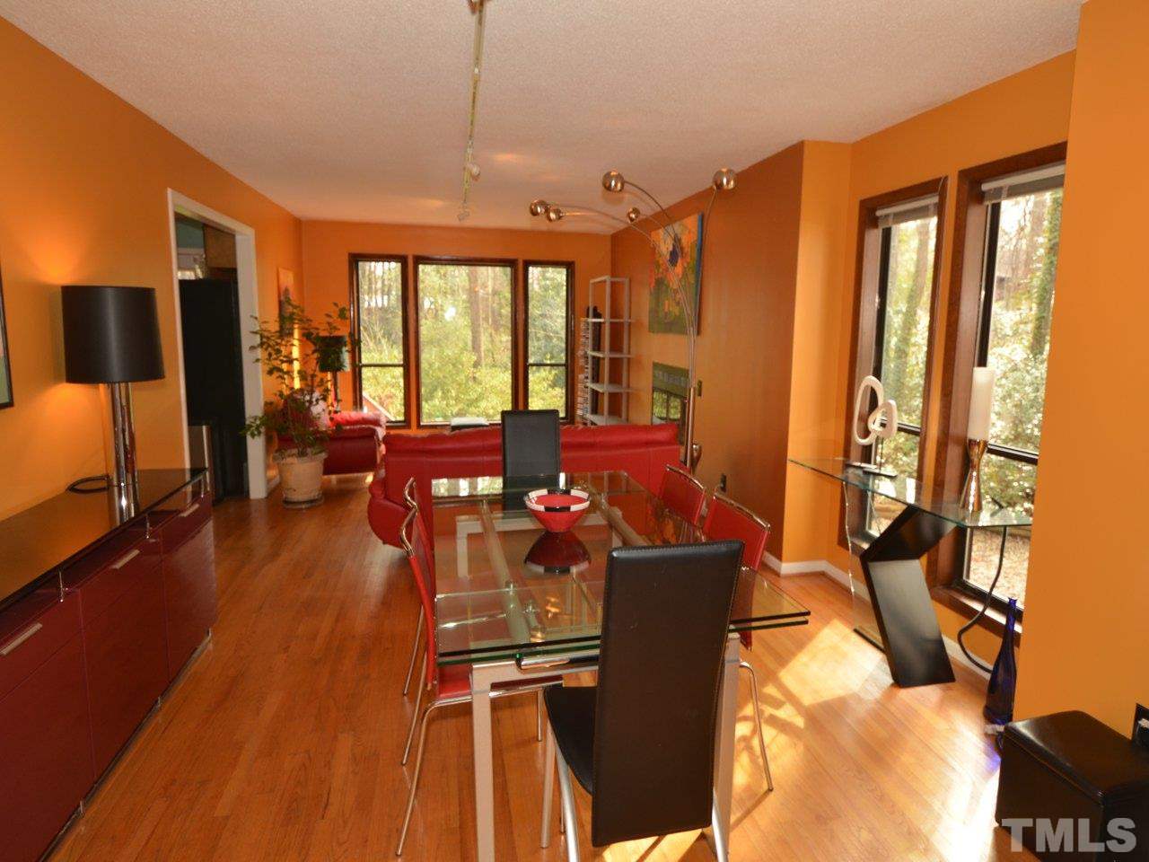 2812 Old Orchard Road Raleigh, NC 27607 - Photo 3 of 25 a view of a livingroom with furniture window and wooden floor