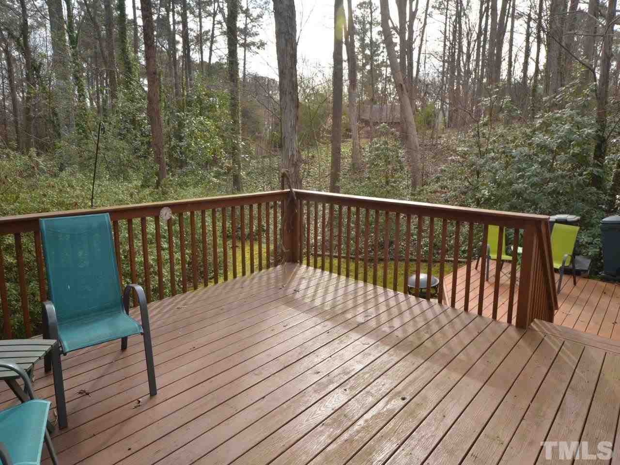 2812 Old Orchard Road Raleigh, NC 27607 - Photo 21 of 25 a balcony with wooden floor and fence