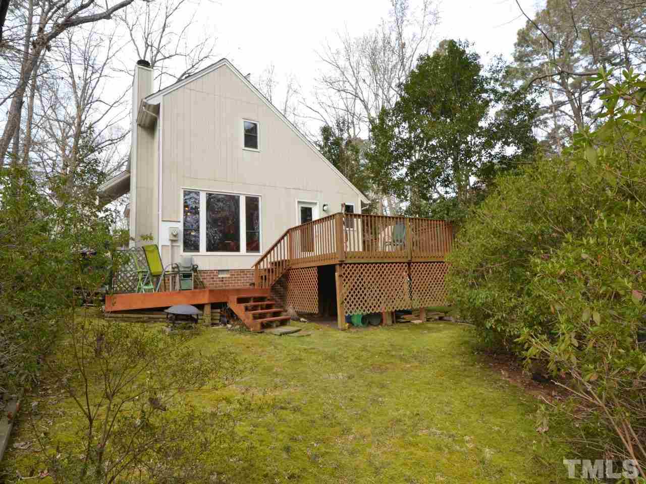 2812 Old Orchard Road Raleigh, NC 27607 - Photo 24 of 25 a view of a house with backyard and sitting area