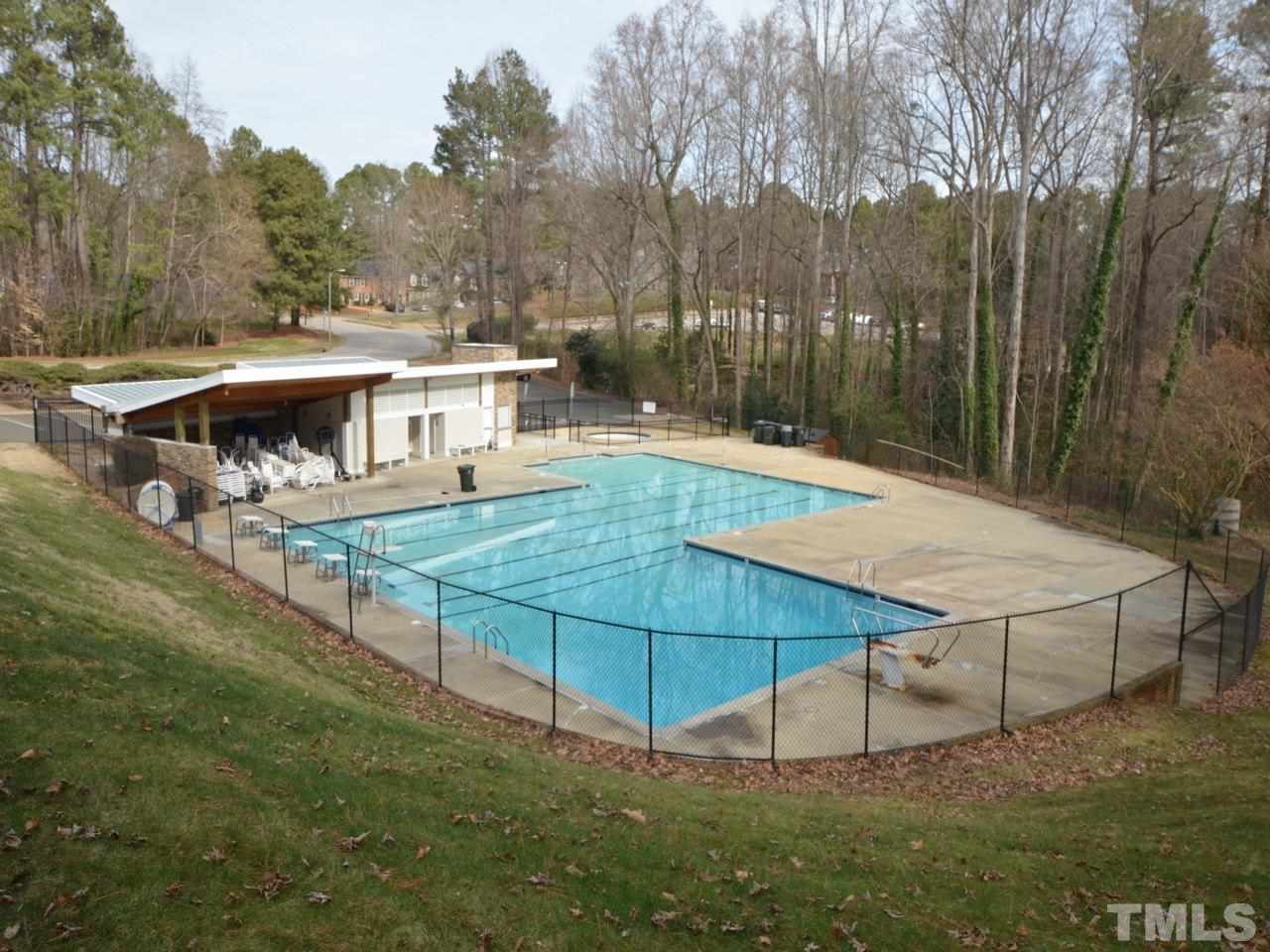 2812 Old Orchard Road Raleigh, NC 27607 - Photo 25 of 25 a view of a swimming pool with a patio