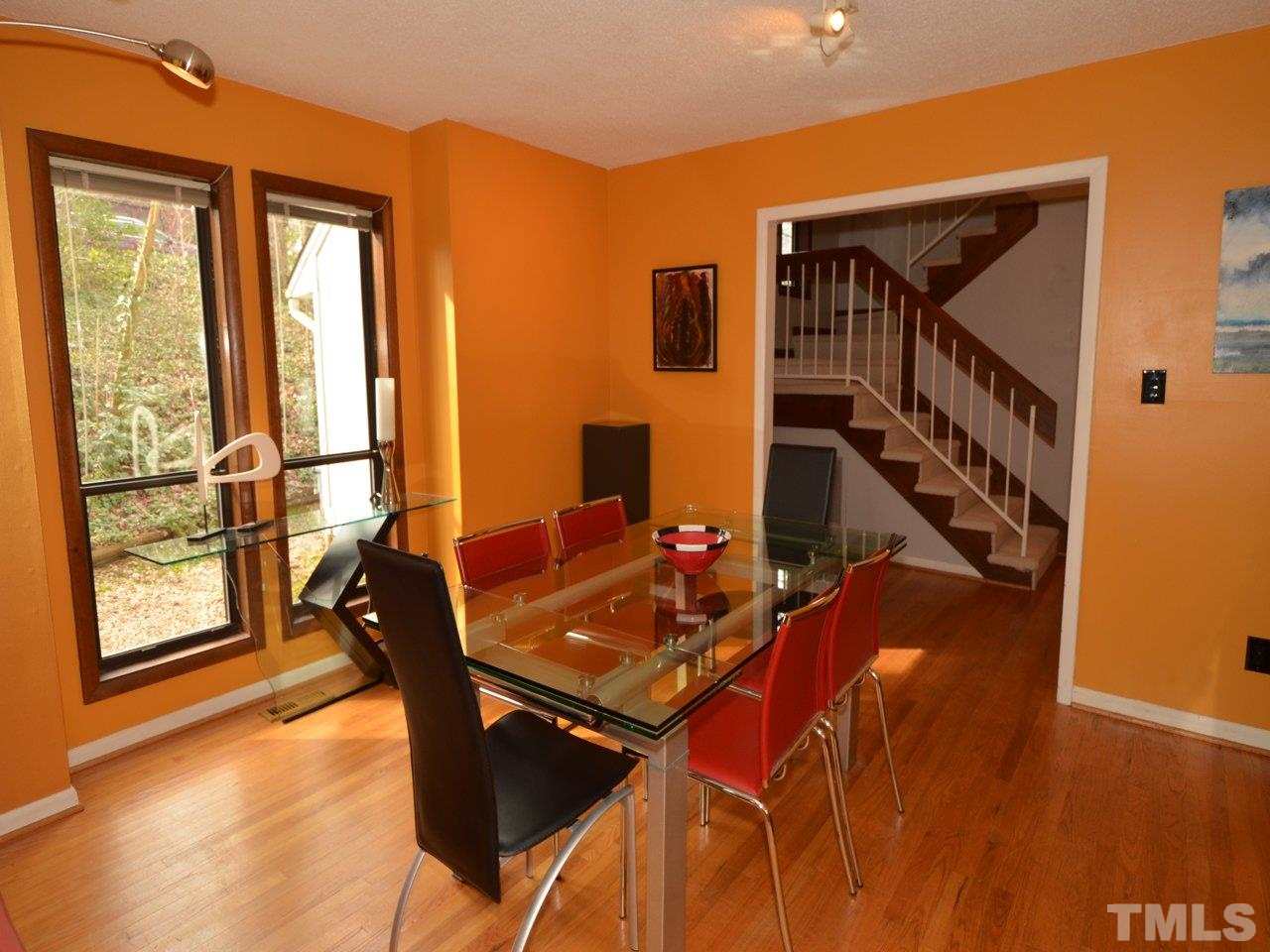 2812 Old Orchard Road Raleigh, NC 27607 - Photo 5 of 25 a view of a dining room with furniture and a window