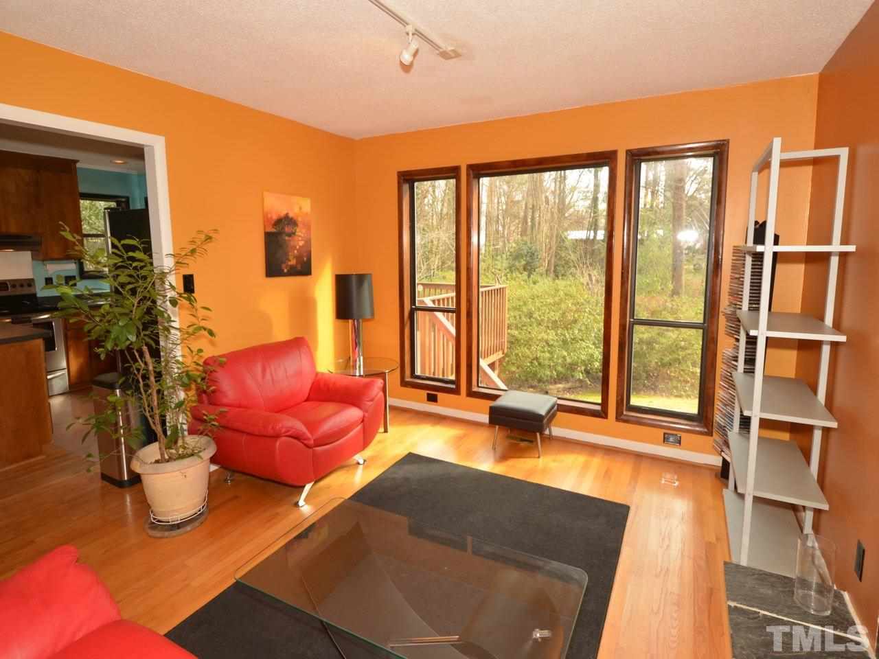 2812 Old Orchard Road Raleigh, NC 27607 - Photo 6 of 25 a living room with furniture and a large window
