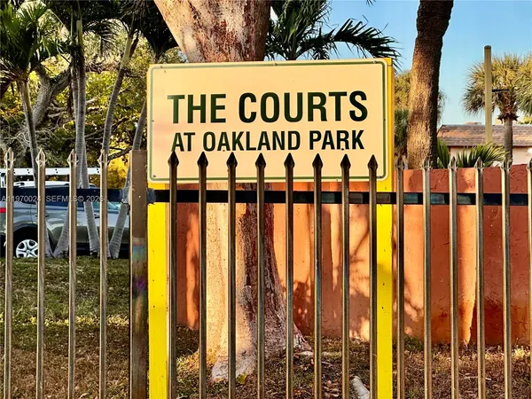 a view of outdoor space with wooden fence