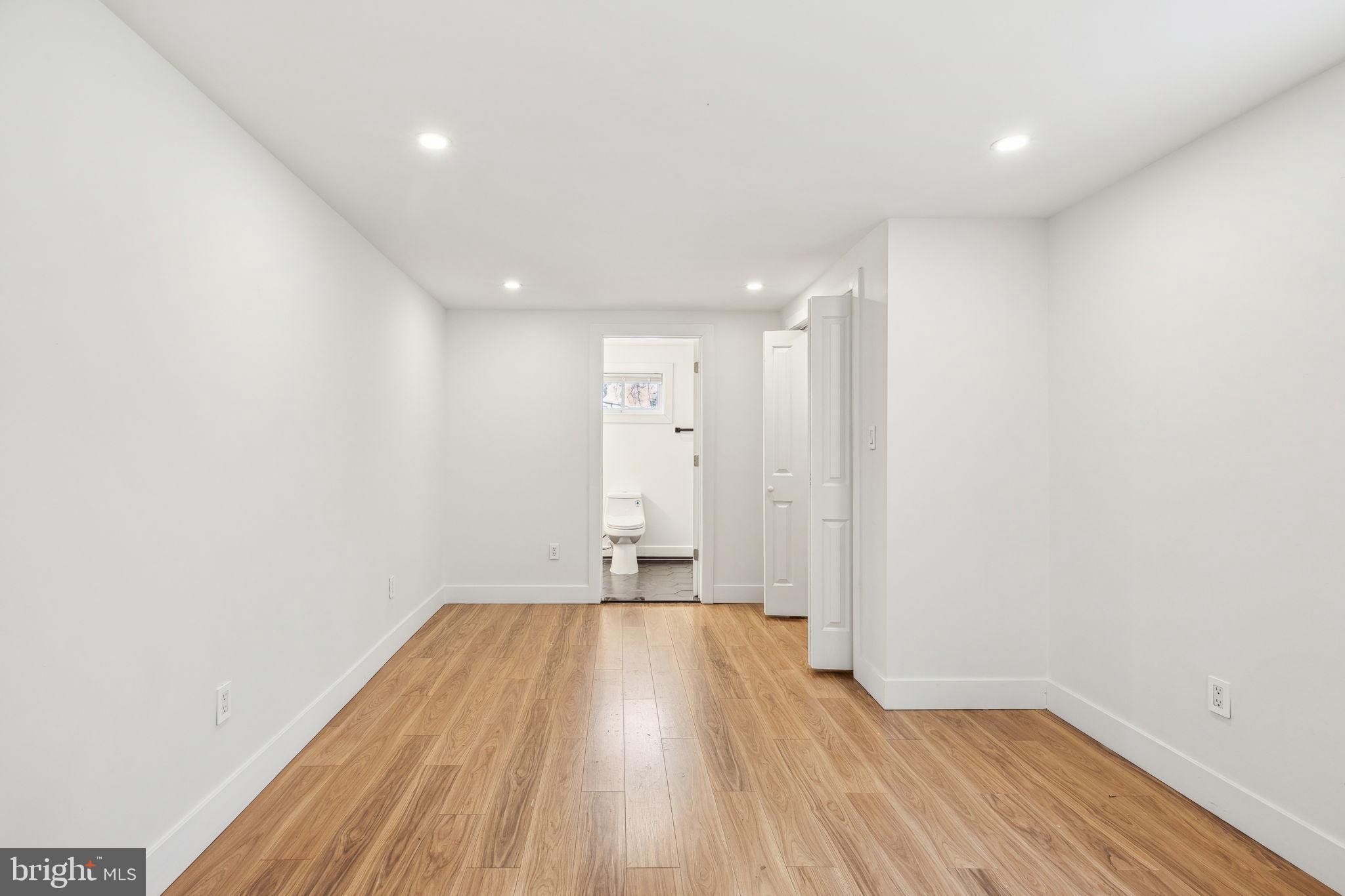 2014 North 3rd Street, Unit B Philadelphia, PA 19122 - Photo 12 of 19 a view of a big room with wooden floor and windows