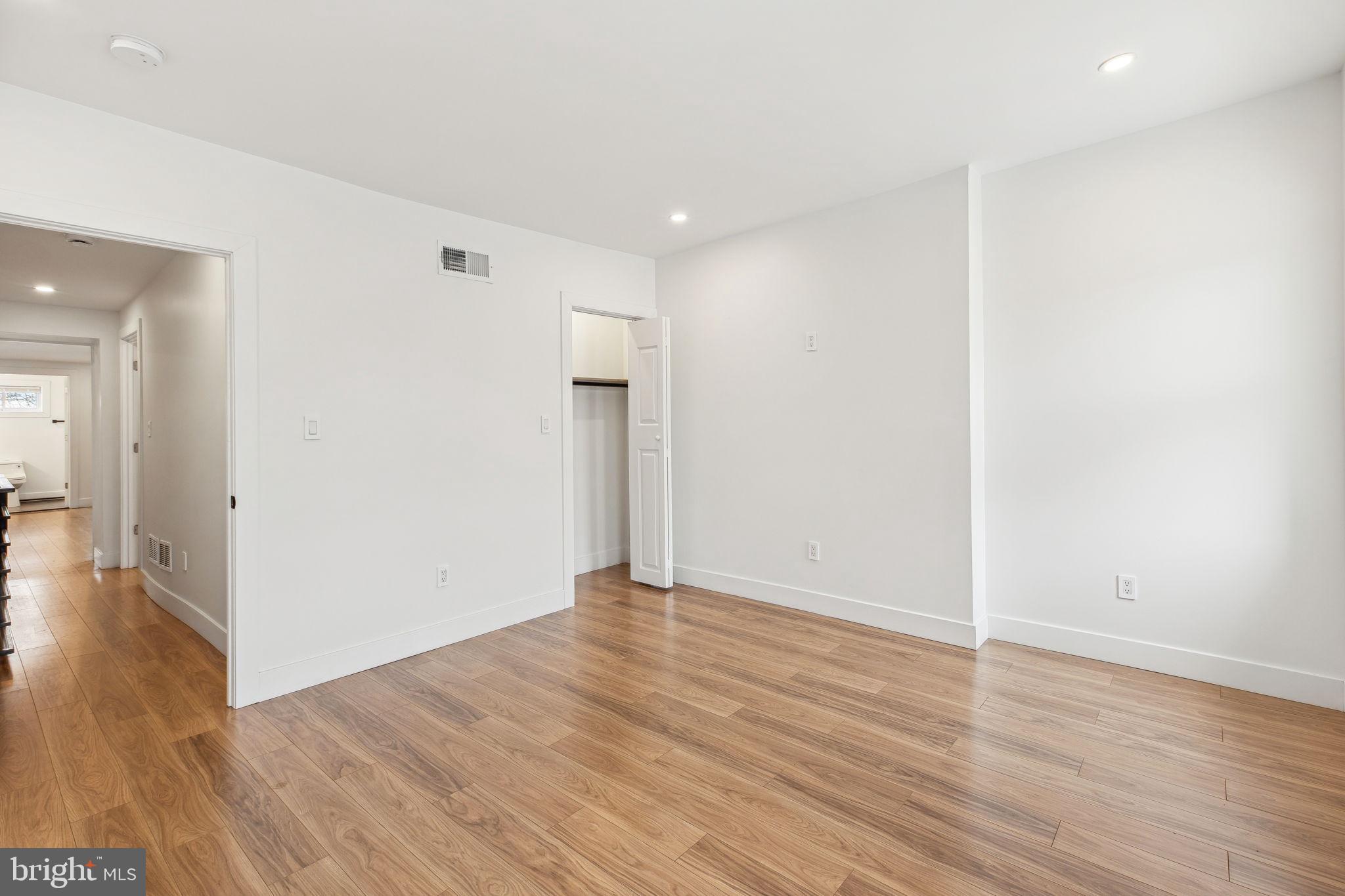 2014 North 3rd Street, Unit B Philadelphia, PA 19122 - Photo 17 of 19 a view of an empty room with wooden floor