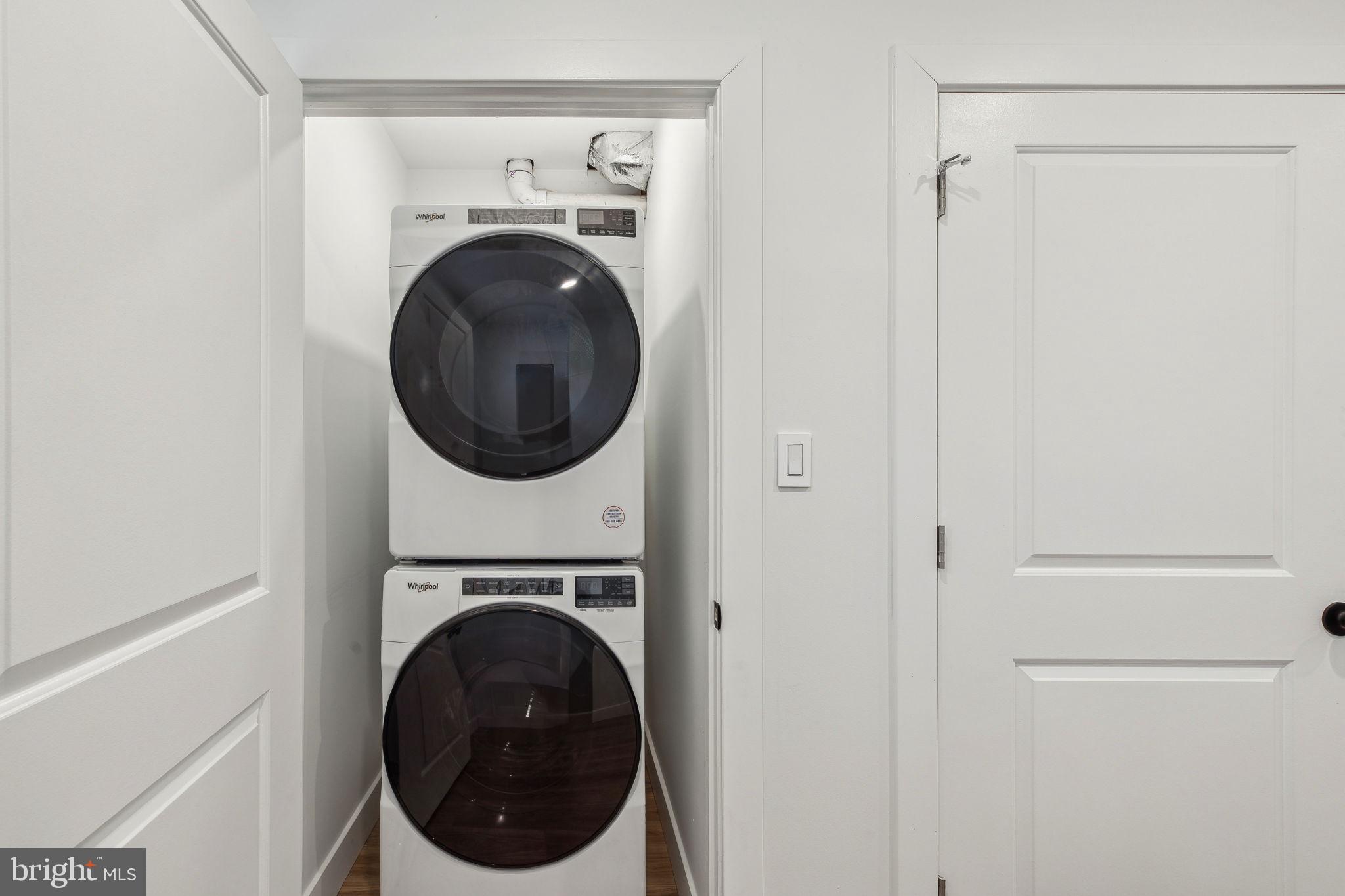 2014 North 3rd Street, Unit B Philadelphia, PA 19122 - Photo 6 of 19 a utility room with dryer and washer