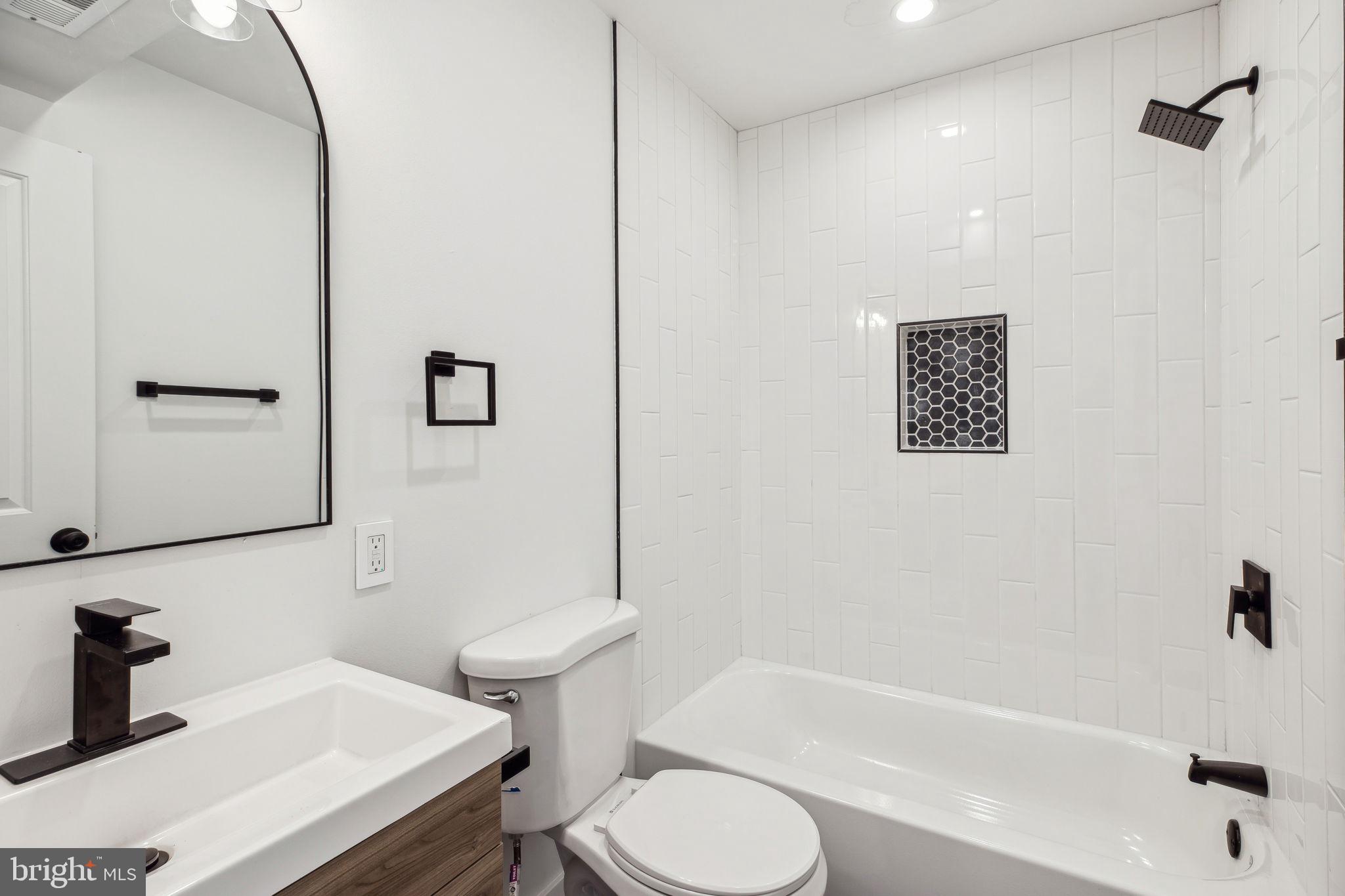 2014 North 3rd Street, Unit B Philadelphia, PA 19122 - Photo 9 of 19 a bathroom with a sink toilet and shower