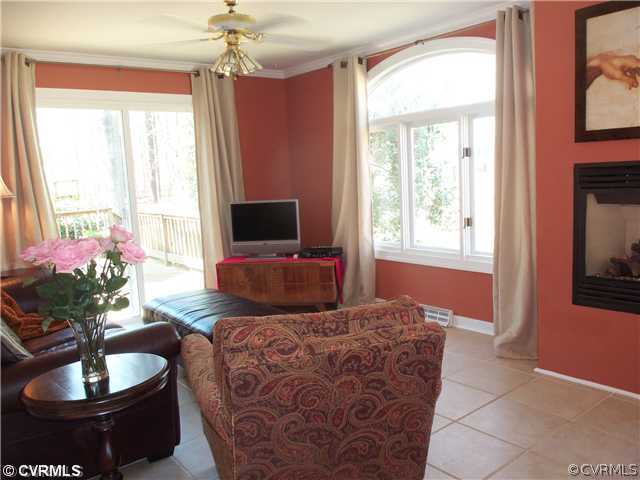 3020 Vistapoint Road Midlothian, VA 23113 - Photo 11 of 24 a living room with furniture a chandelier and a window