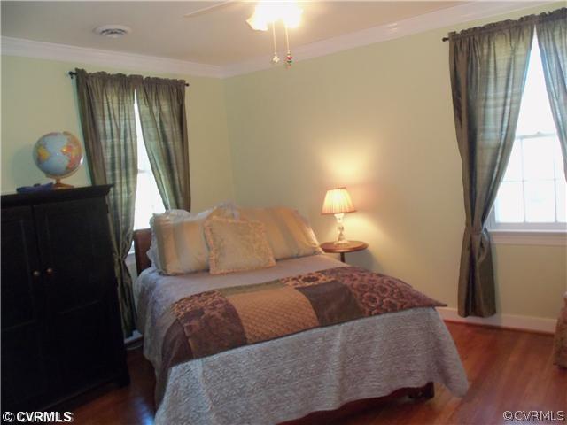 3020 Vistapoint Road Midlothian, VA 23113 - Photo 18 of 24 a bedroom with a bed and window with wooden floor