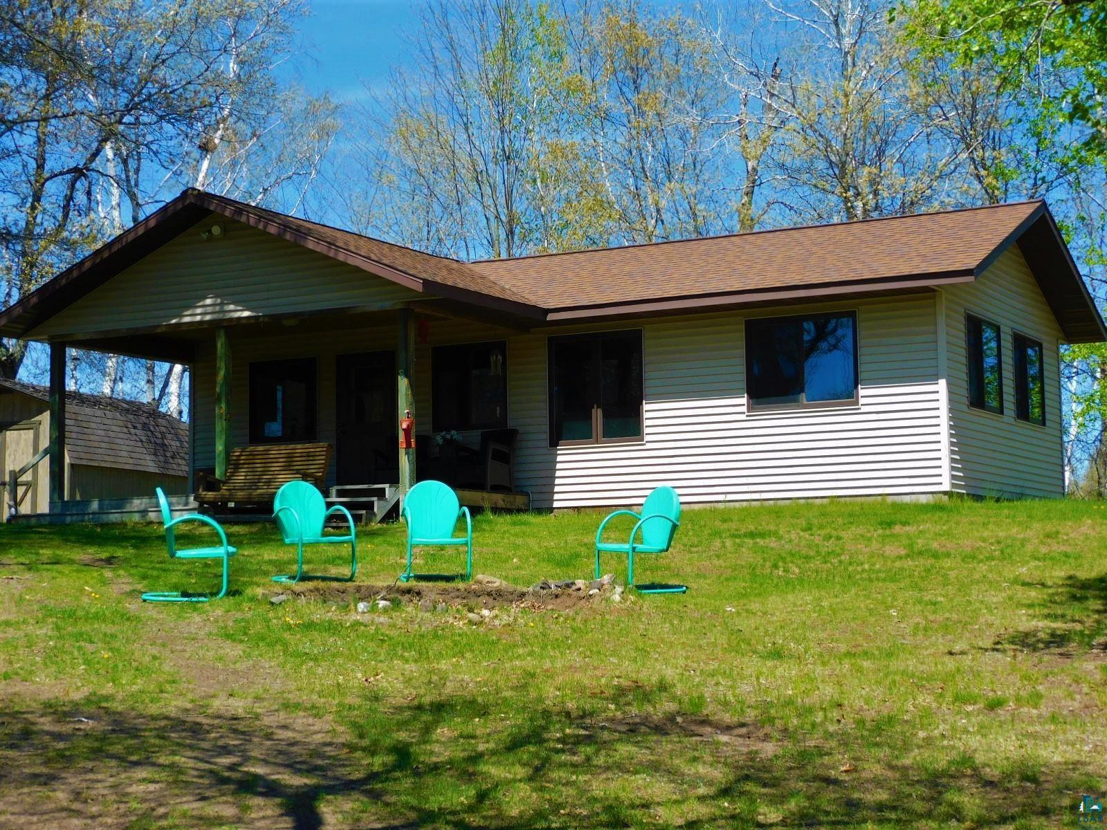 2520 Bony Lake Road Barnes, WI 54873 - Photo 1 of 44 Back of house featuring a lawn