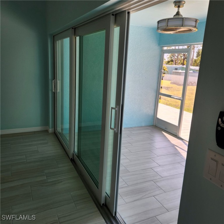 5651 Genesee Parkway, Unit 5651 Bokeelia, FL 33922 - Photo 24 of 27 a view of an entryway with a window
