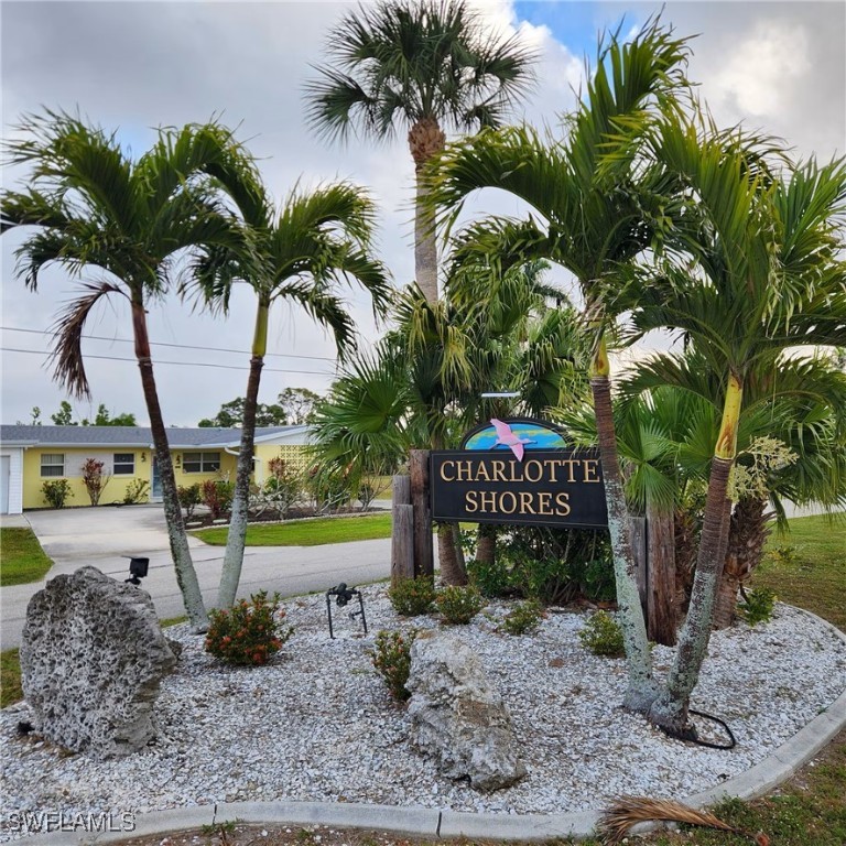 5651 Genesee Parkway, Unit 5651 Bokeelia, FL 33922 - Photo 6 of 27 a view of outdoor space with sign board