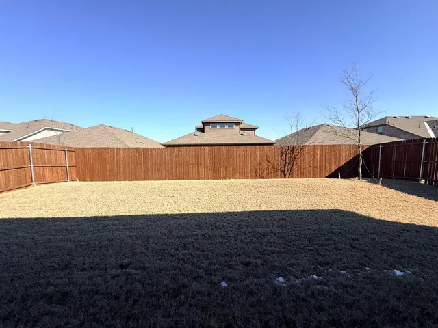 a view of outdoor space and yard