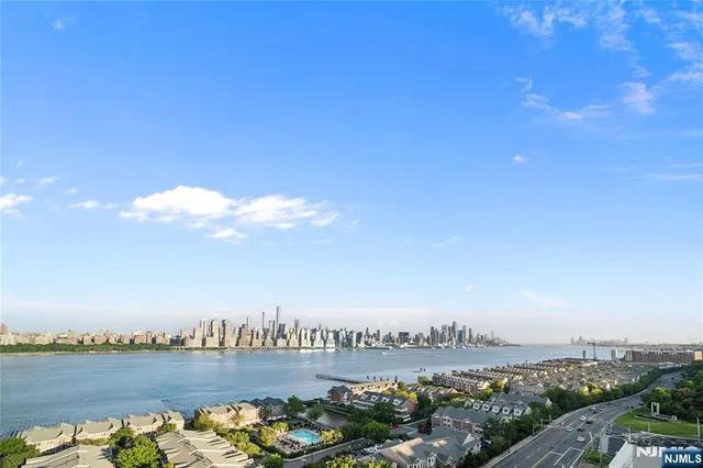 a view of a city with lots of ocean