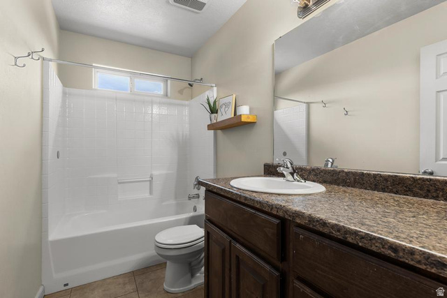 225 Falcon Court Ivins, UT 84738 - Photo 17 of 47 Full bathroom with vanity, tub / shower combination, and light tile patterned floors
