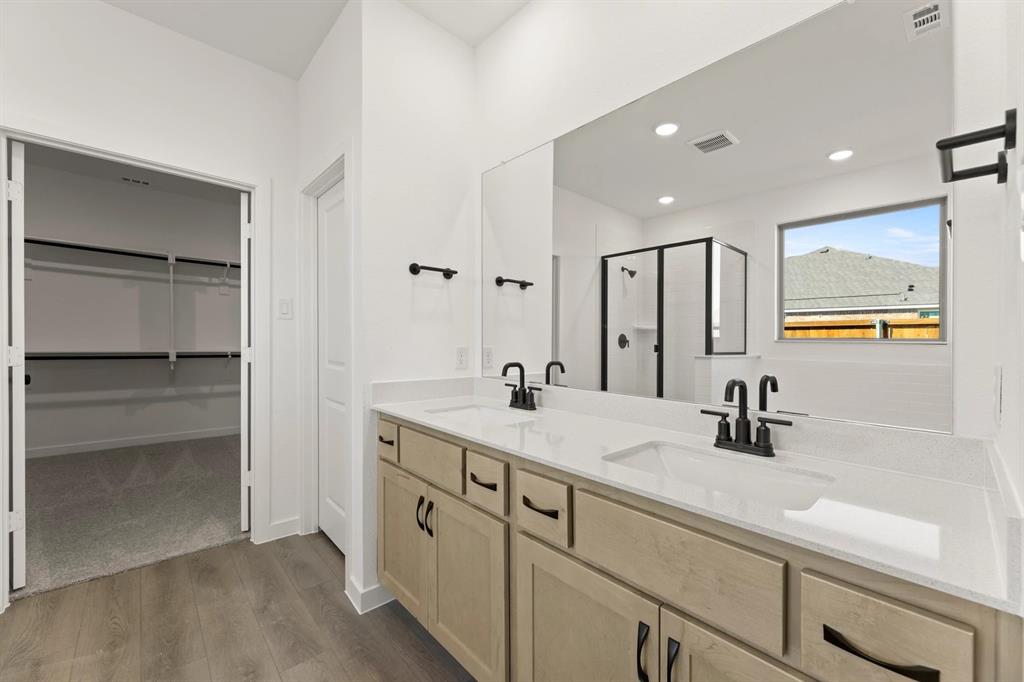 1512 Bushman Lane Forney, TX 75126 - Photo 23 of 28 Primary Bathroom featuring the Artisan Collection