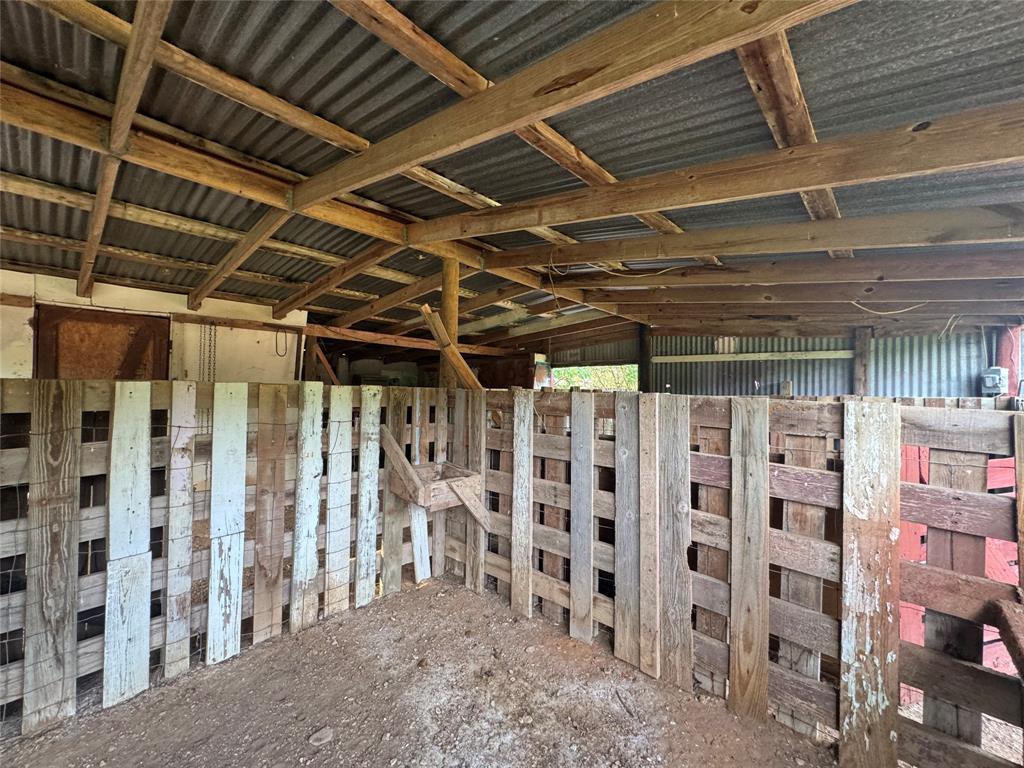 608 Cherokee Street Bellmead, TX 76705 - Photo 11 of 38 a view of a room with racks of the wall