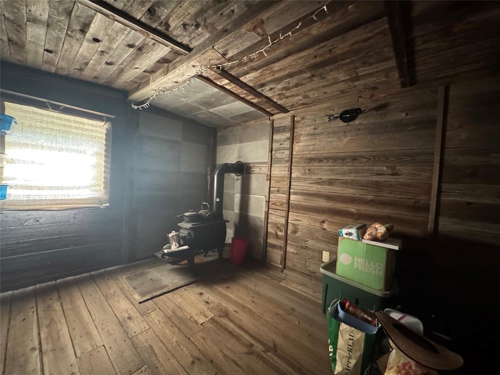608 Cherokee Street Bellmead, TX 76705 - Photo 23 of 38 a room with wooden floor and a window