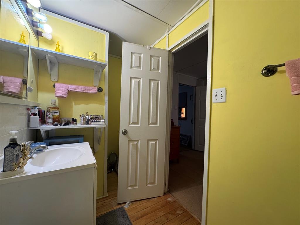 608 Cherokee Street Bellmead, TX 76705 - Photo 29 of 38 a room with storage and utility