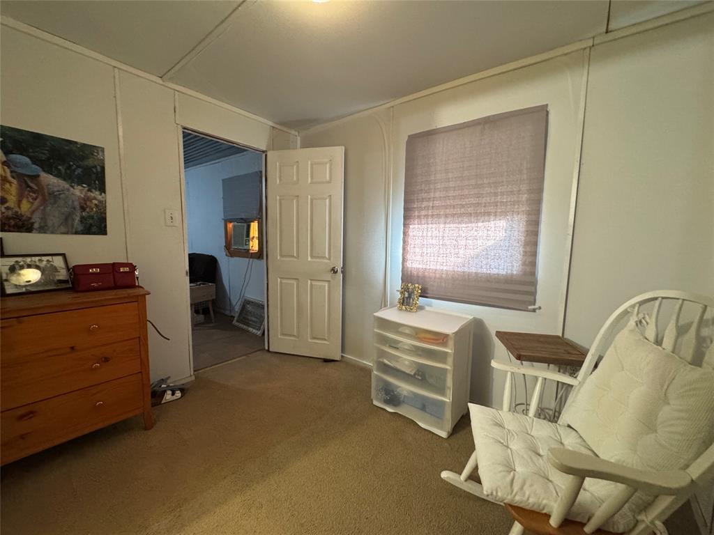 608 Cherokee Street Bellmead, TX 76705 - Photo 31 of 38 a bedroom with furniture and a window