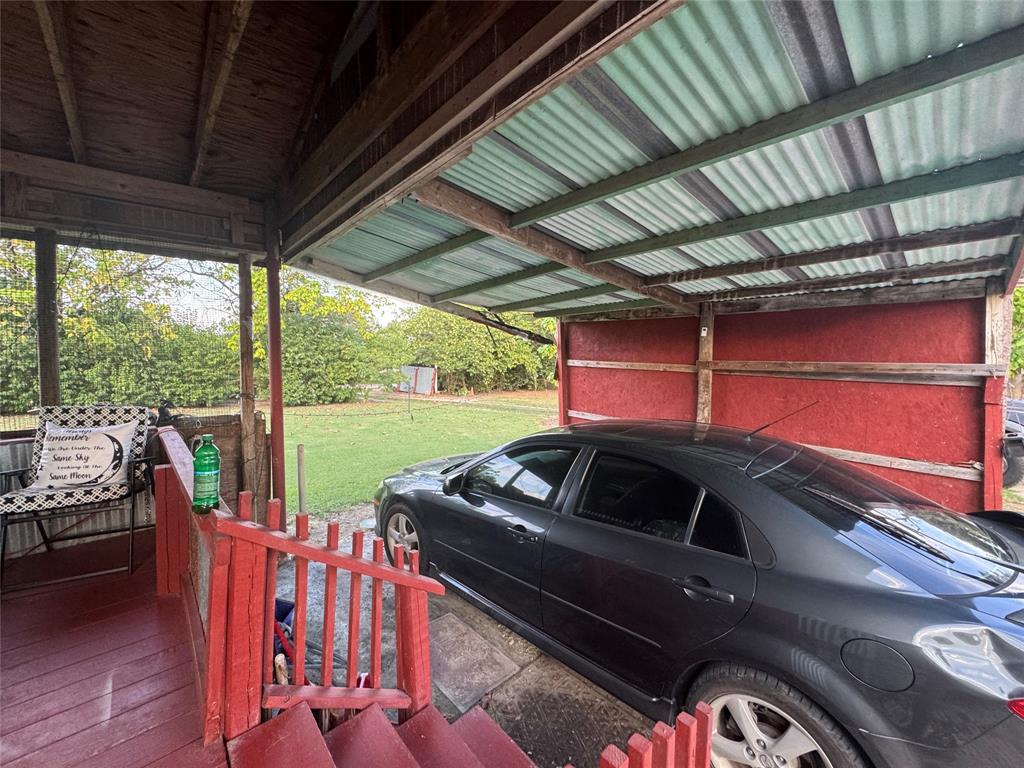 608 Cherokee Street Bellmead, TX 76705 - Photo 37 of 38 a view of a patio with table and chairs