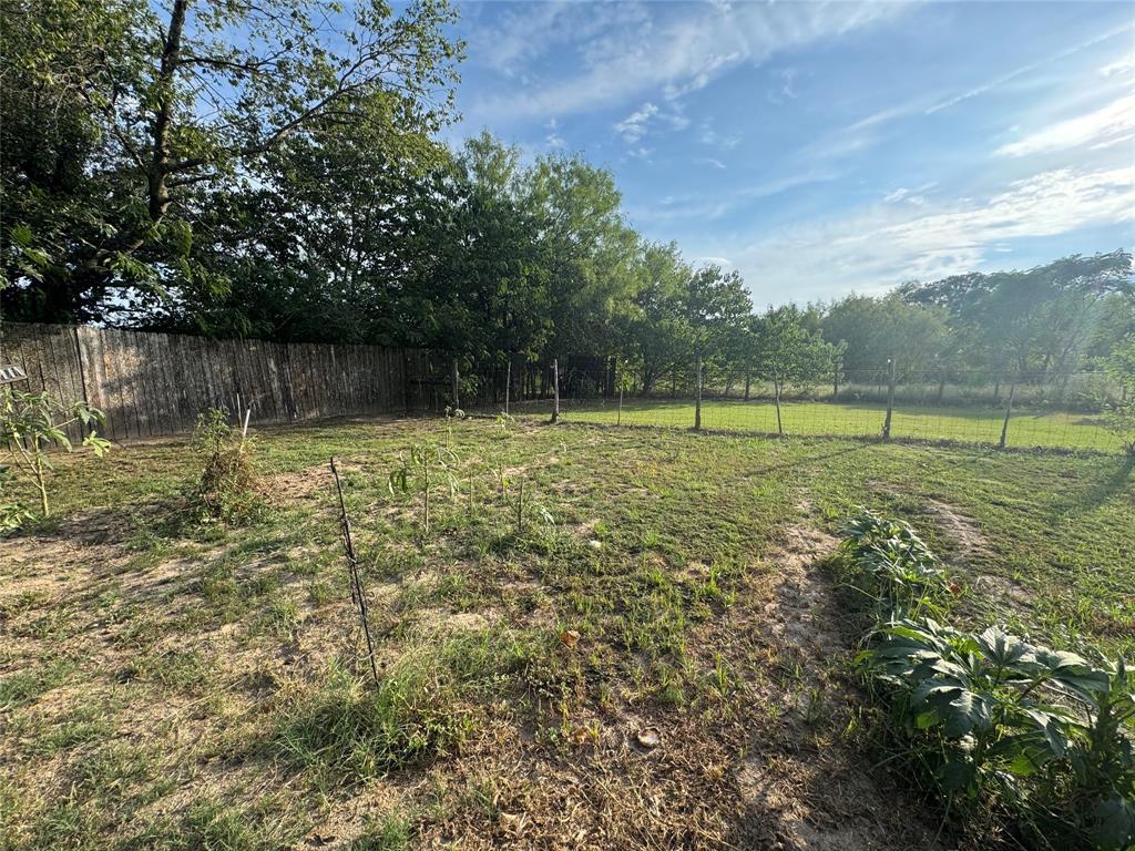 608 Cherokee Street Bellmead, TX 76705 - Photo 5 of 38 a view of a lake with a large trees