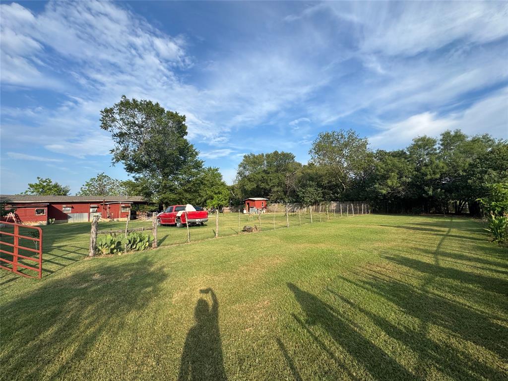 608 Cherokee Street Bellmead, TX 76705 - Photo 7 of 38 a view of a park with large trees