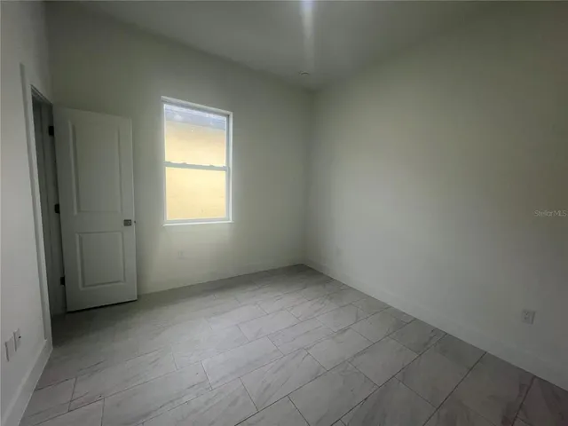 an empty room with a window