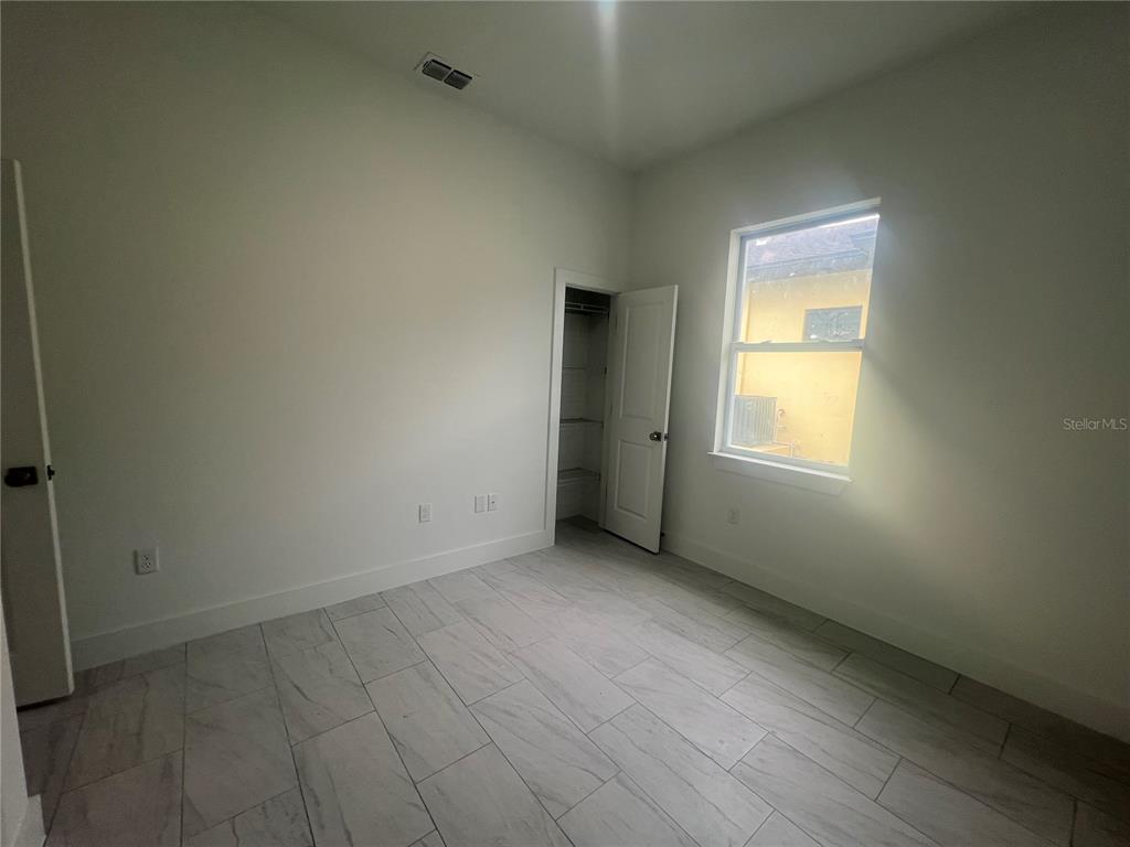 187 Sesame Road East Rotonda West, FL 33947 - Photo 27 of 28 an empty room with a window